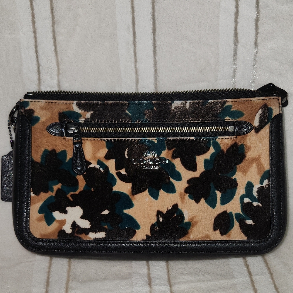 Coach Nolita bag in scattered leaf printed haircalf.